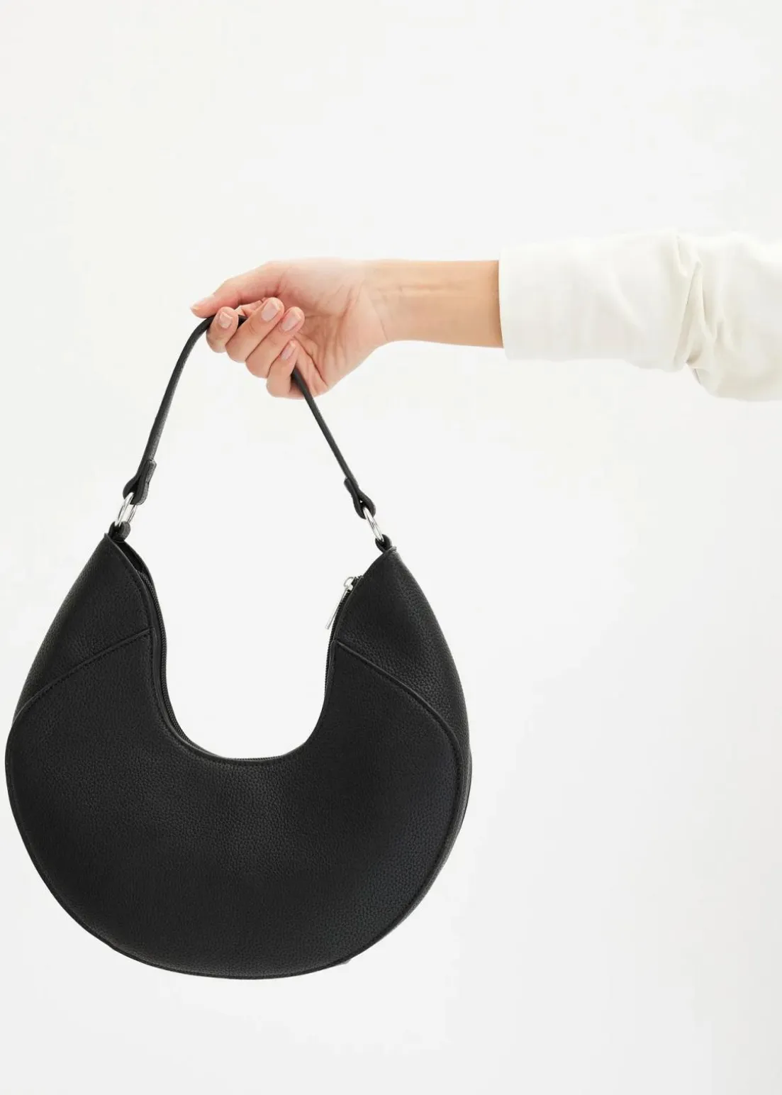 Handtasche in rundlicher Form