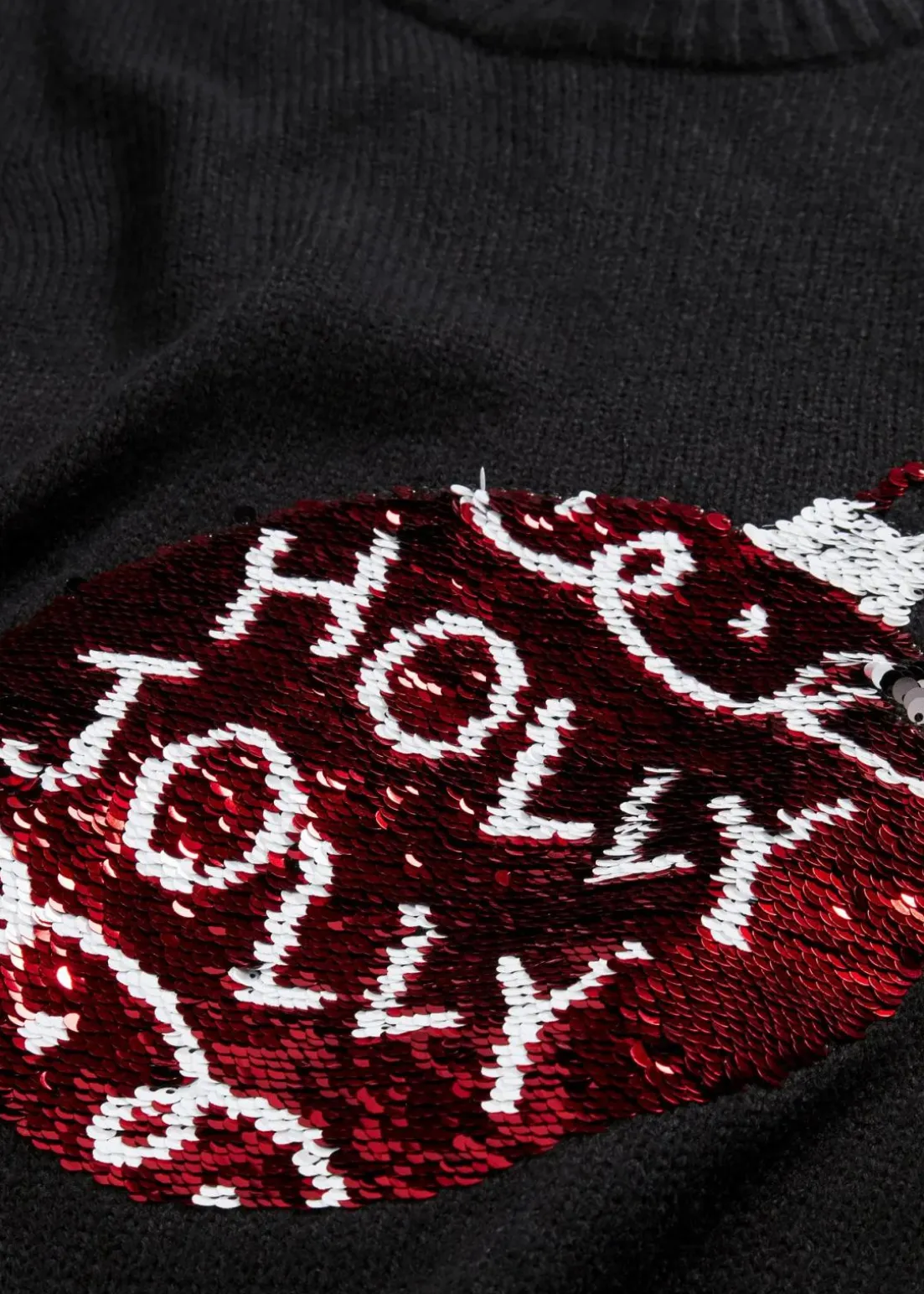 Weihnachtspullover mit Wendepailletten