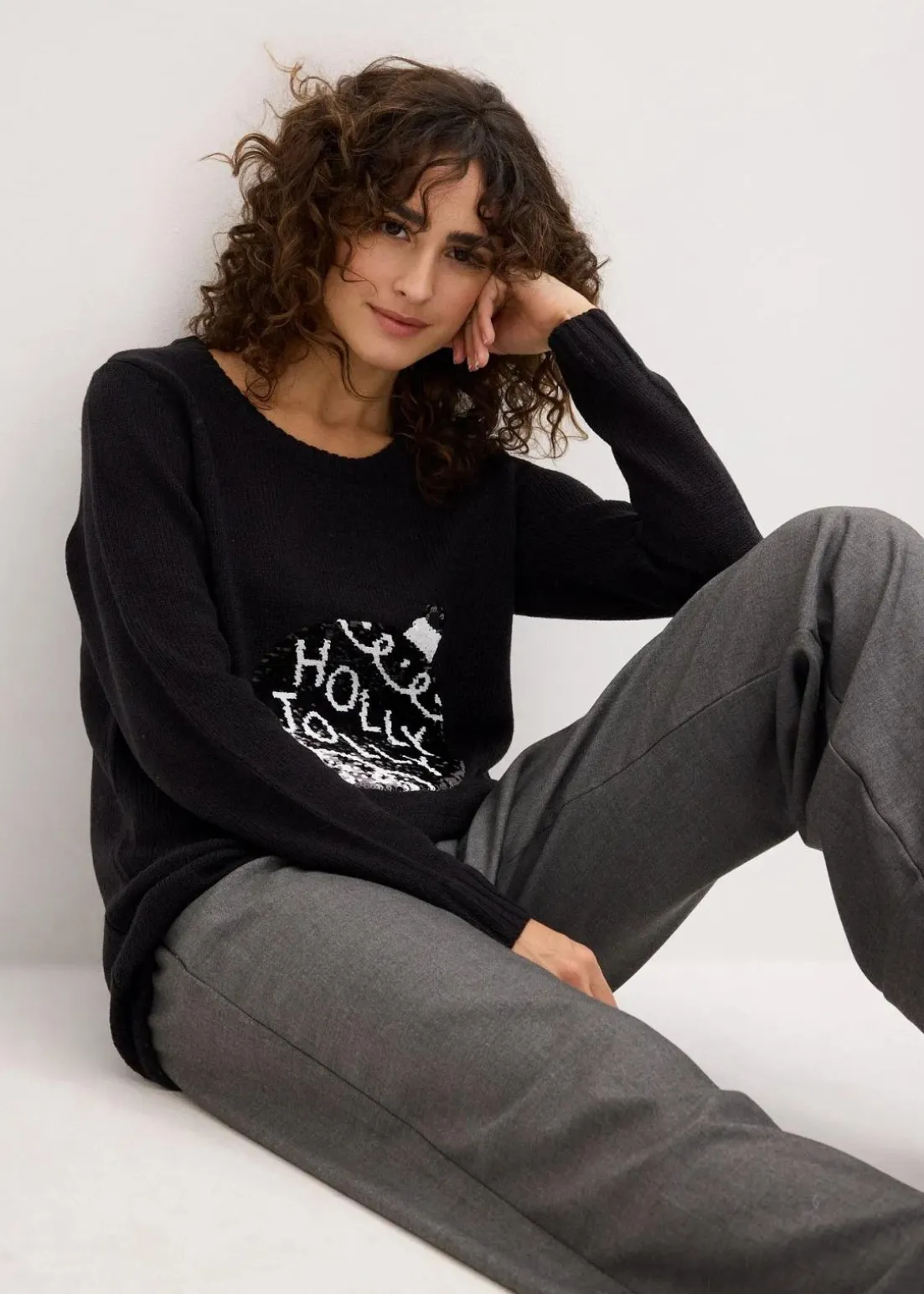 Weihnachtspullover mit Wendepailletten